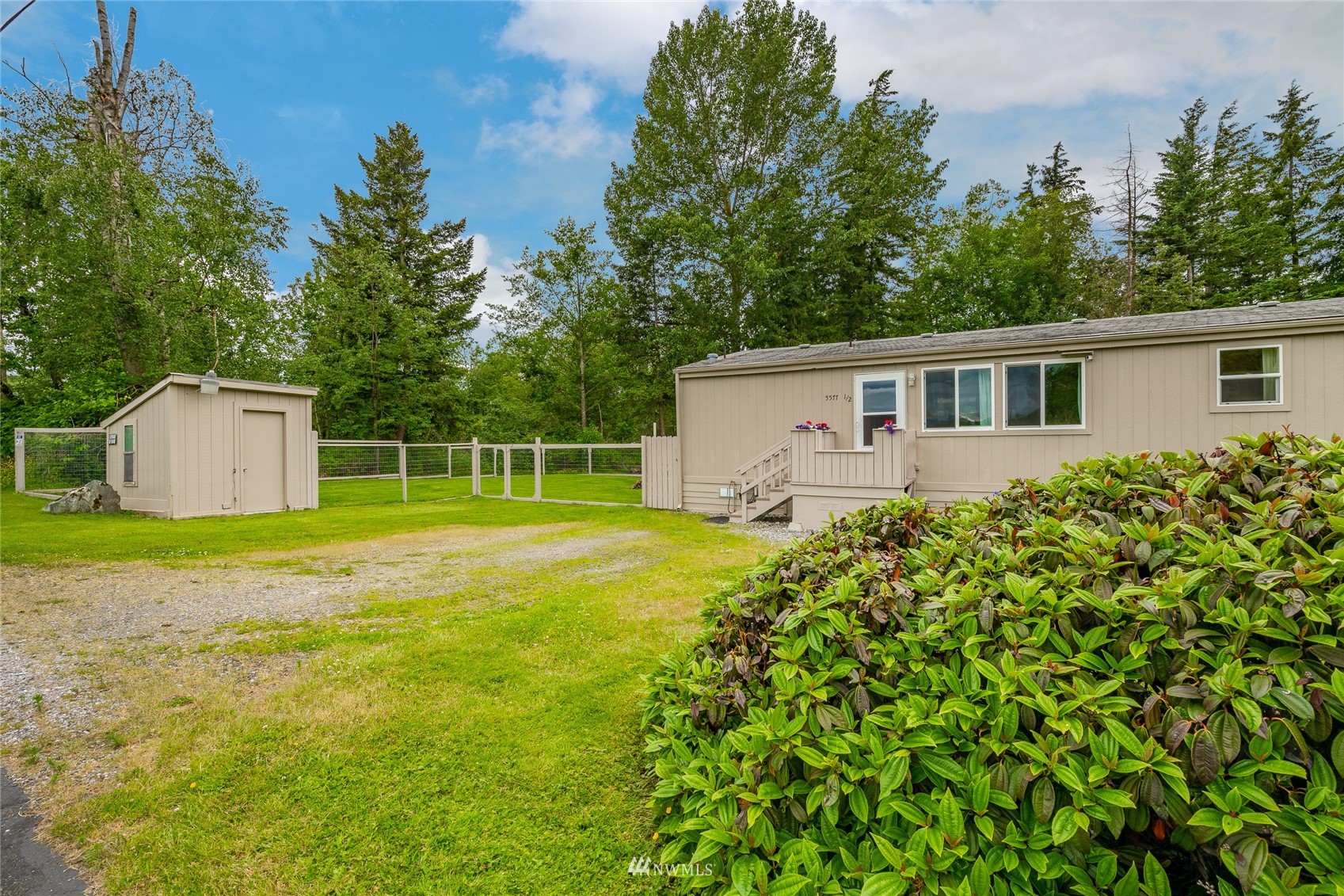 5577 E Road Bellingham, WA 98226 - Photo 8 of 40 a house view with a garden space