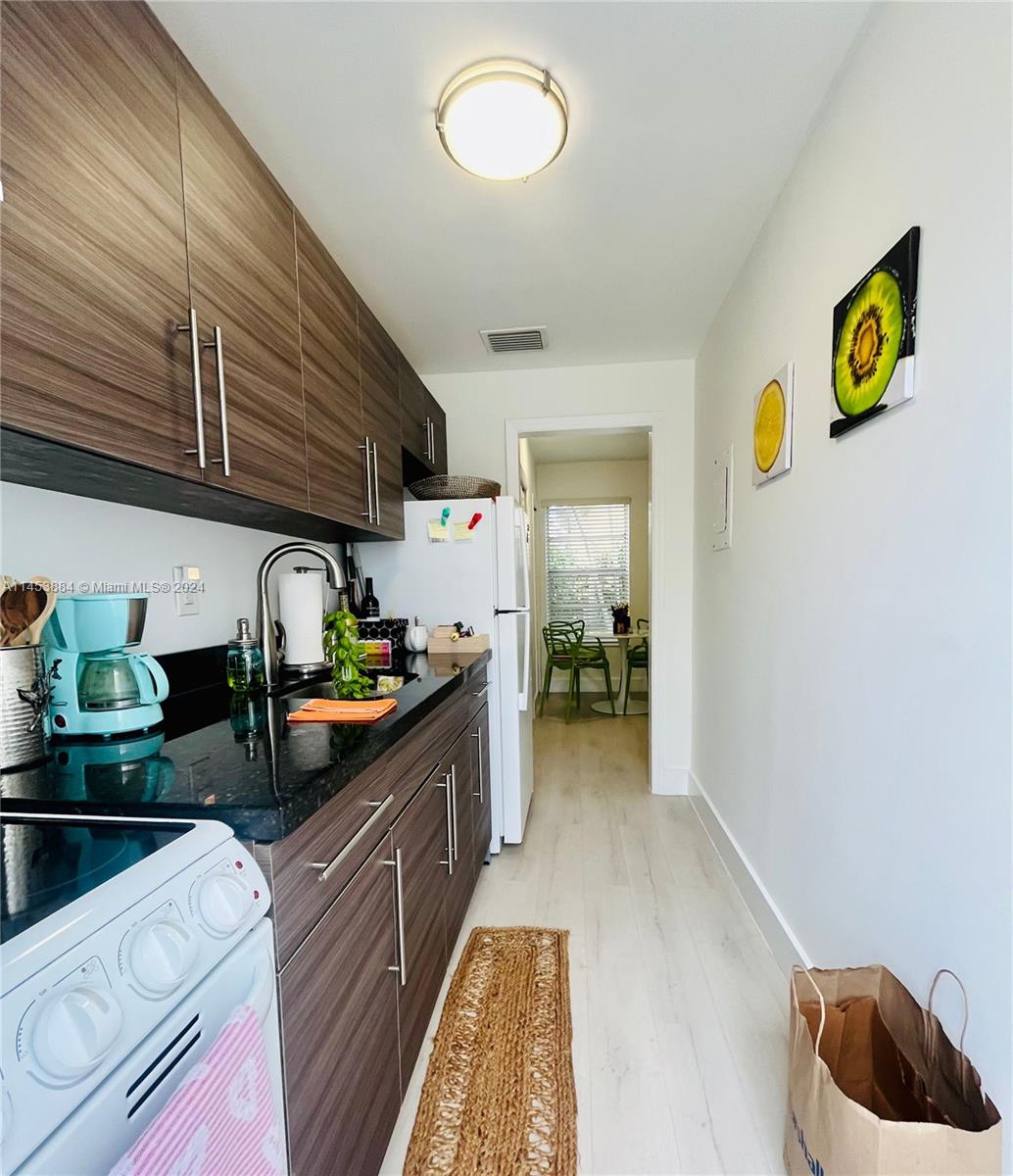 6955 Rue Vendome Miami Beach, FL 33141 - Photo 23 of 43 a kitchen with lots of counter top space