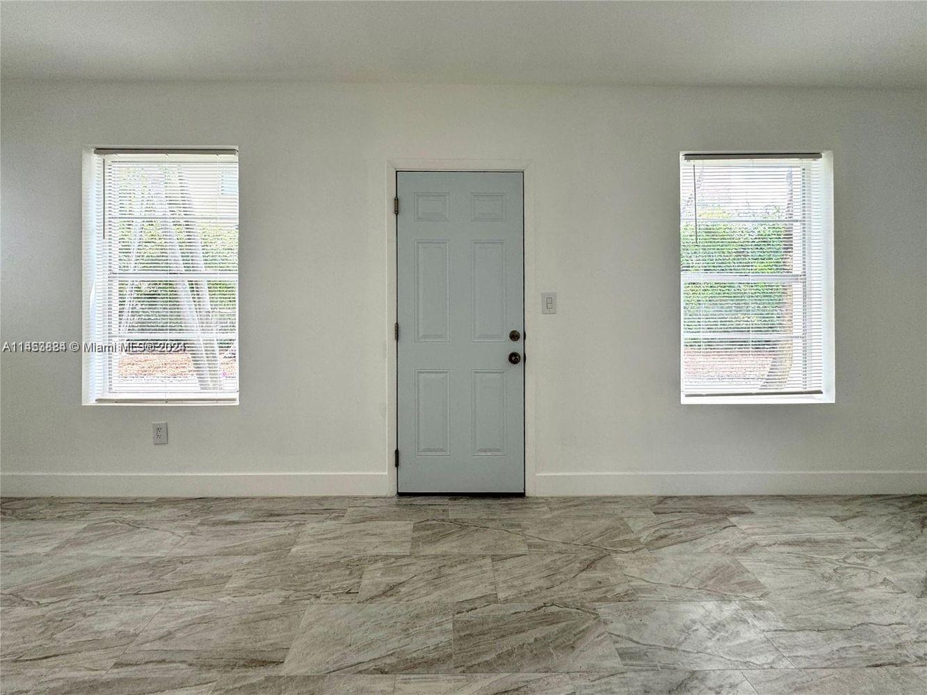 6955 Rue Vendome Miami Beach, FL 33141 - Photo 39 of 43 a view of an empty room with a window