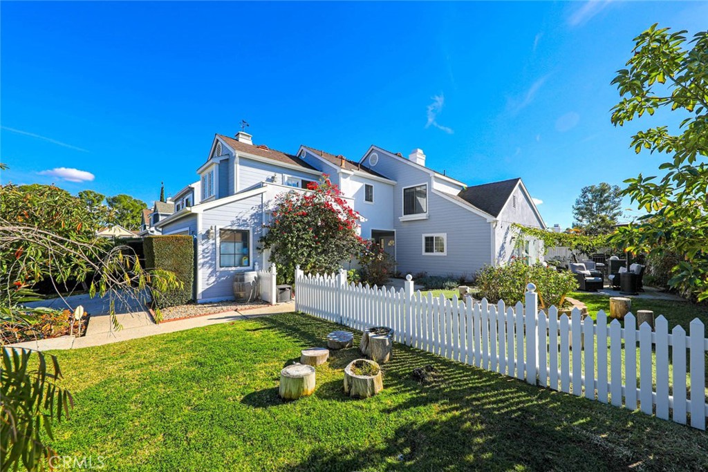 20975 Sequoia Lane Mission Viejo, CA 92691 - Photo 2 of 47 a view of a house with a yard and flower plants