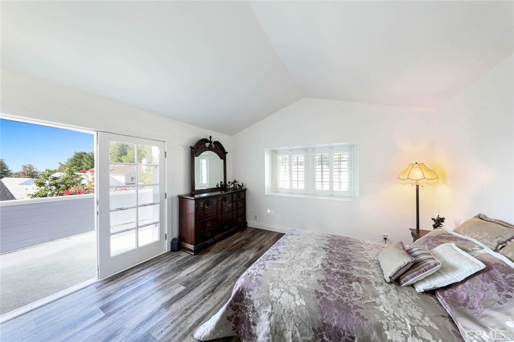 20975 Sequoia Lane Mission Viejo, CA 92691 - Photo 21 of 47 a bedroom with a bed and a dresser next to a window