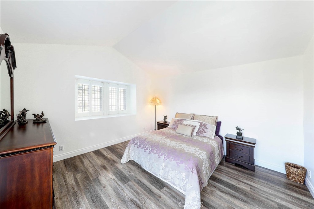 20975 Sequoia Lane Mission Viejo, CA 92691 - Photo 22 of 47 a bedroom with a bed and a window