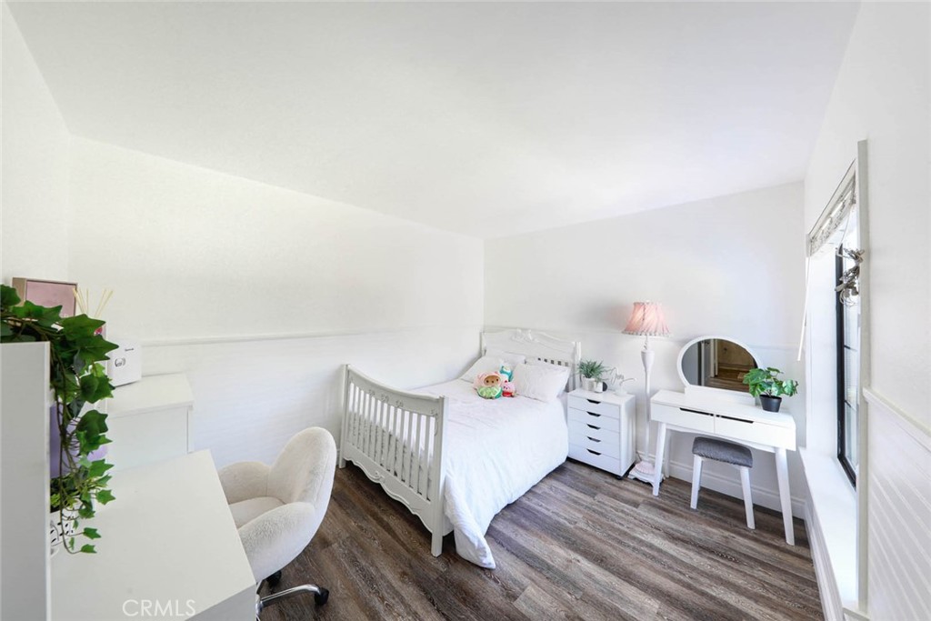 20975 Sequoia Lane Mission Viejo, CA 92691 - Photo 30 of 47 a bedroom with a bed and a chair in it