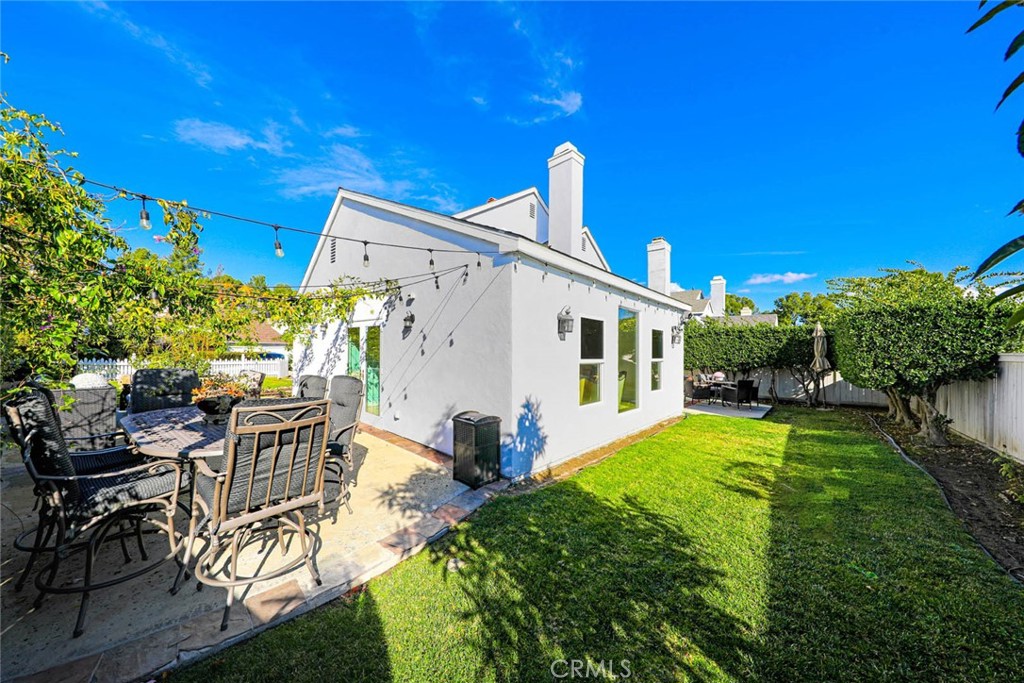 20975 Sequoia Lane Mission Viejo, CA 92691 - Photo 33 of 47 a view of a house with backyard sitting area and garden