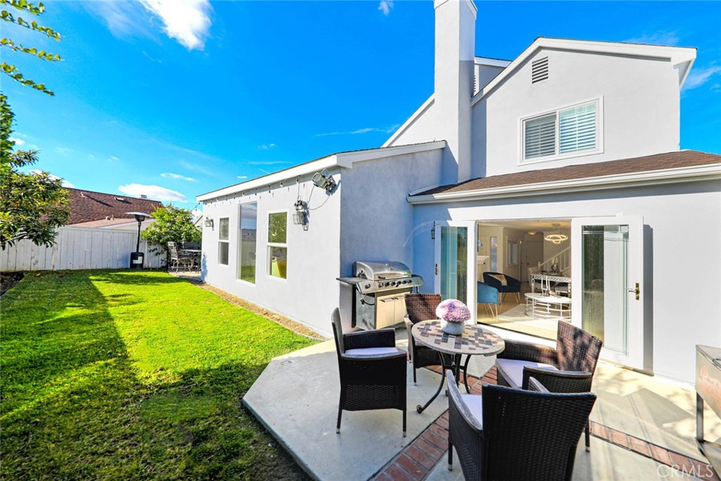 20975 Sequoia Lane Mission Viejo, CA 92691 - Photo 34 of 47 a view of a house with backyard sitting area and swimming pool