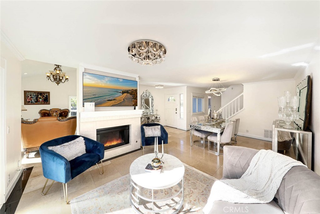 20975 Sequoia Lane Mission Viejo, CA 92691 - Photo 8 of 47 a living room with furniture and a fireplace