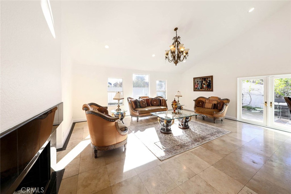 20975 Sequoia Lane Mission Viejo, CA 92691 - Photo 10 of 47 a living room with furniture a couch and a flat screen tv
