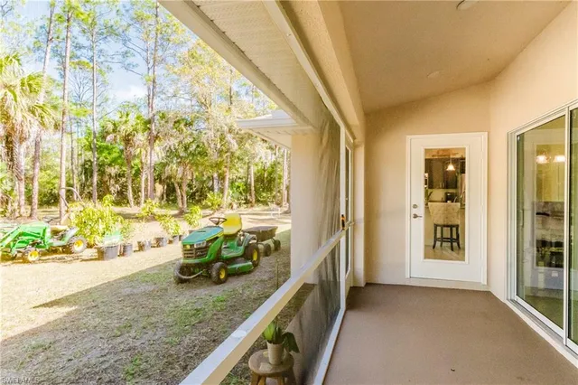 a view of a porch with furniture