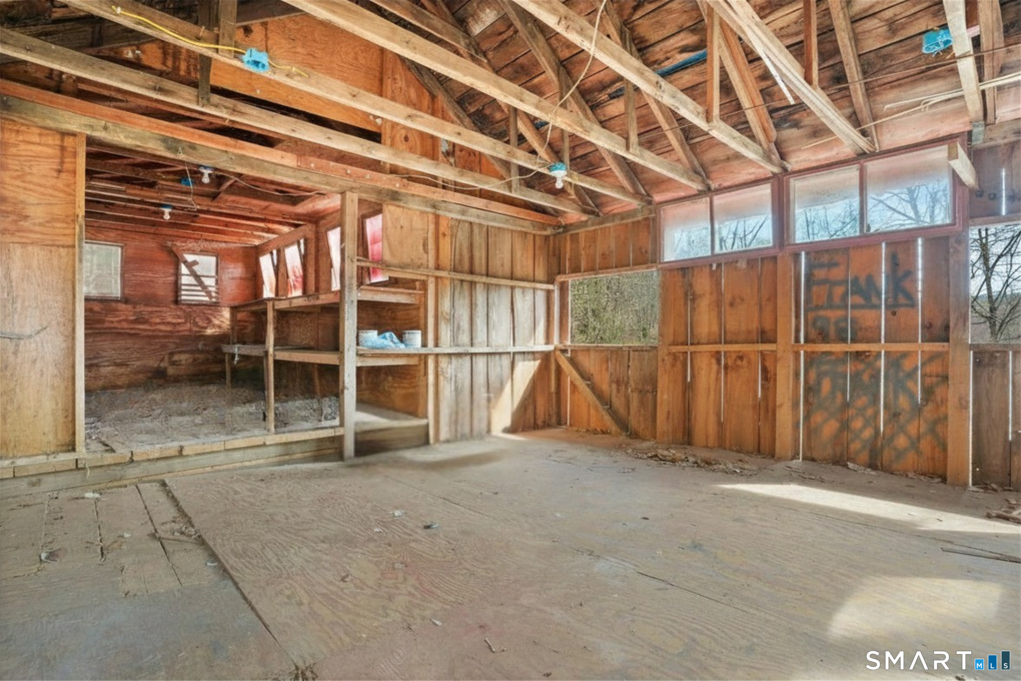 60 Riggs Street Oxford, CT 06478 - Photo 12 of 38 2 story barn interior- perfect for hobbies such as painting, woodworking, workshopping!