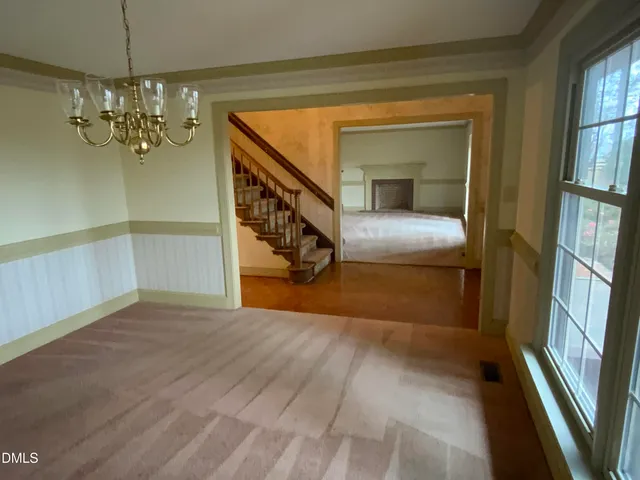a view of livingroom with furniture and windows