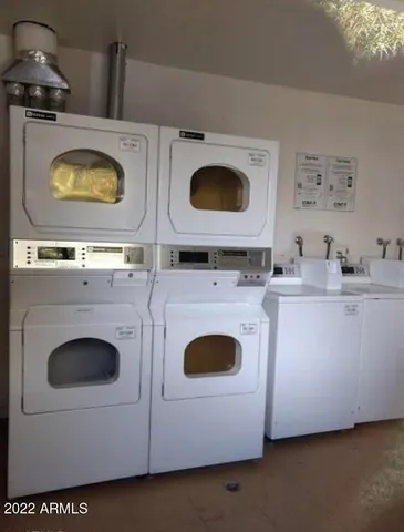 a kitchen with a stove and a microwave