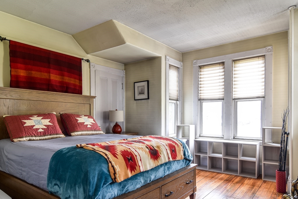 30 Winter Street Framingham, MA 01702 - Photo 11 of 23 a bedroom with a large bed and a window