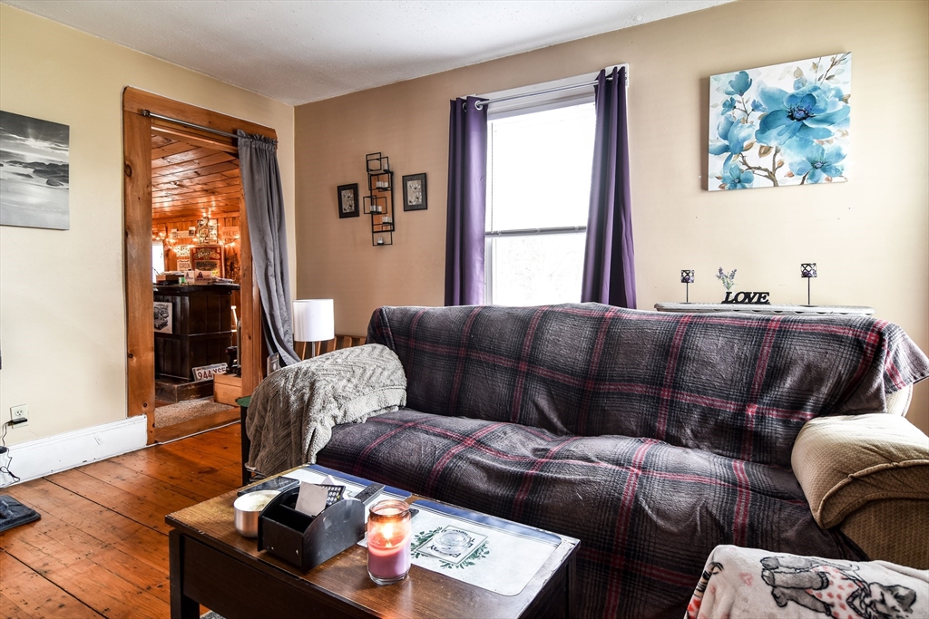 30 Winter Street Framingham, MA 01702 - Photo 15 of 23 a living room with furniture and a window