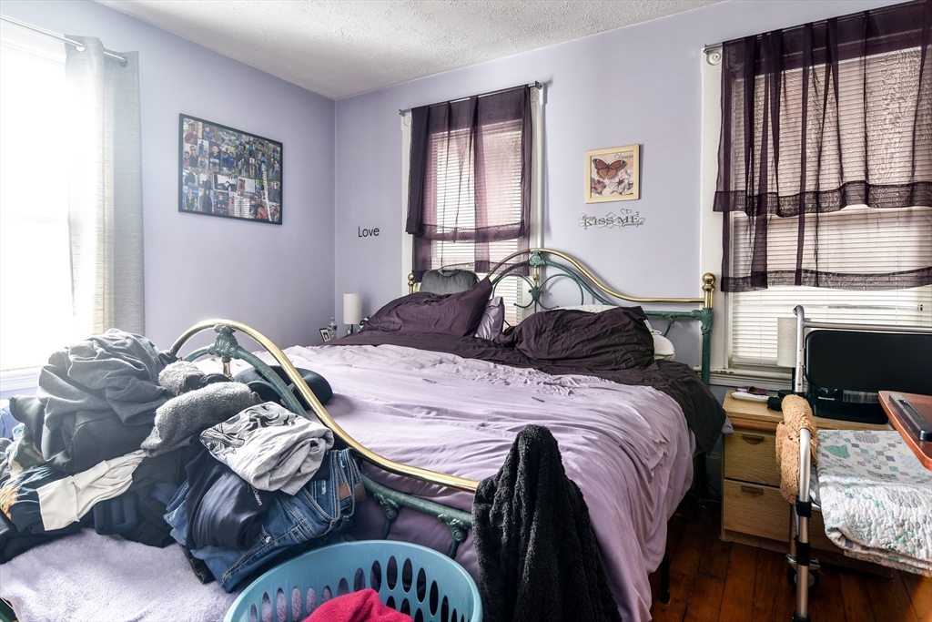 30 Winter Street Framingham, MA 01702 - Photo 19 of 23 a bedroom with a bed and a window