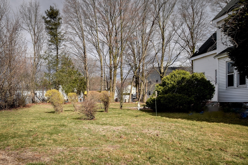 30 Winter Street Framingham, MA 01702 - Photo 22 of 23 a view of backyard with wooden fence