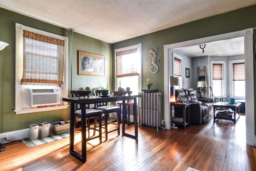 30 Winter Street Framingham, MA 01702 - Photo 5 of 23 a view of a livingroom with furniture and hardwood floor
