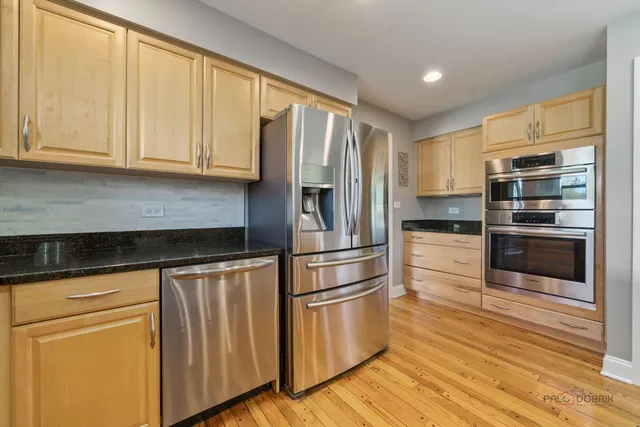 a living room with furniture fireplace and flat screen tv