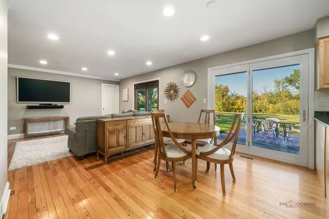 a bedroom with a bed and a table