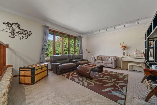 a bathroom with a sink toilet a mirror and shower
