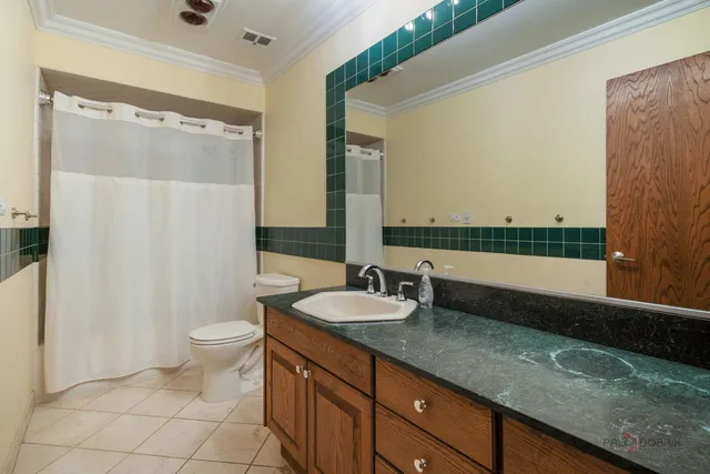 a dining room with furniture and a fireplace
