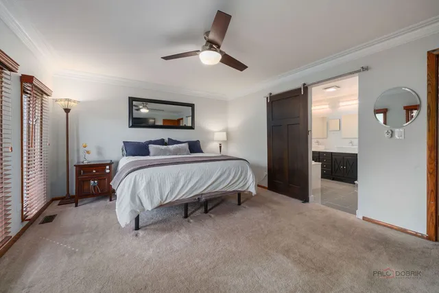 a room with lots of wooden furniture and a sink