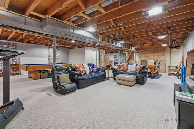 a backyard of a house with lots of green space and garden