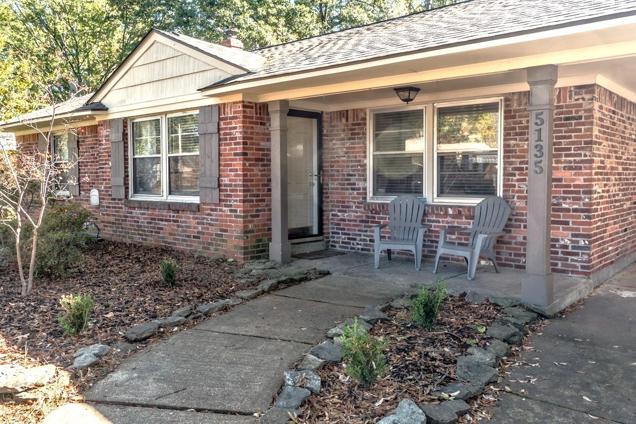 5135 Princeton Road Memphis, TN 38117 - Photo 1 of 24 a front view of a house with outdoor seating