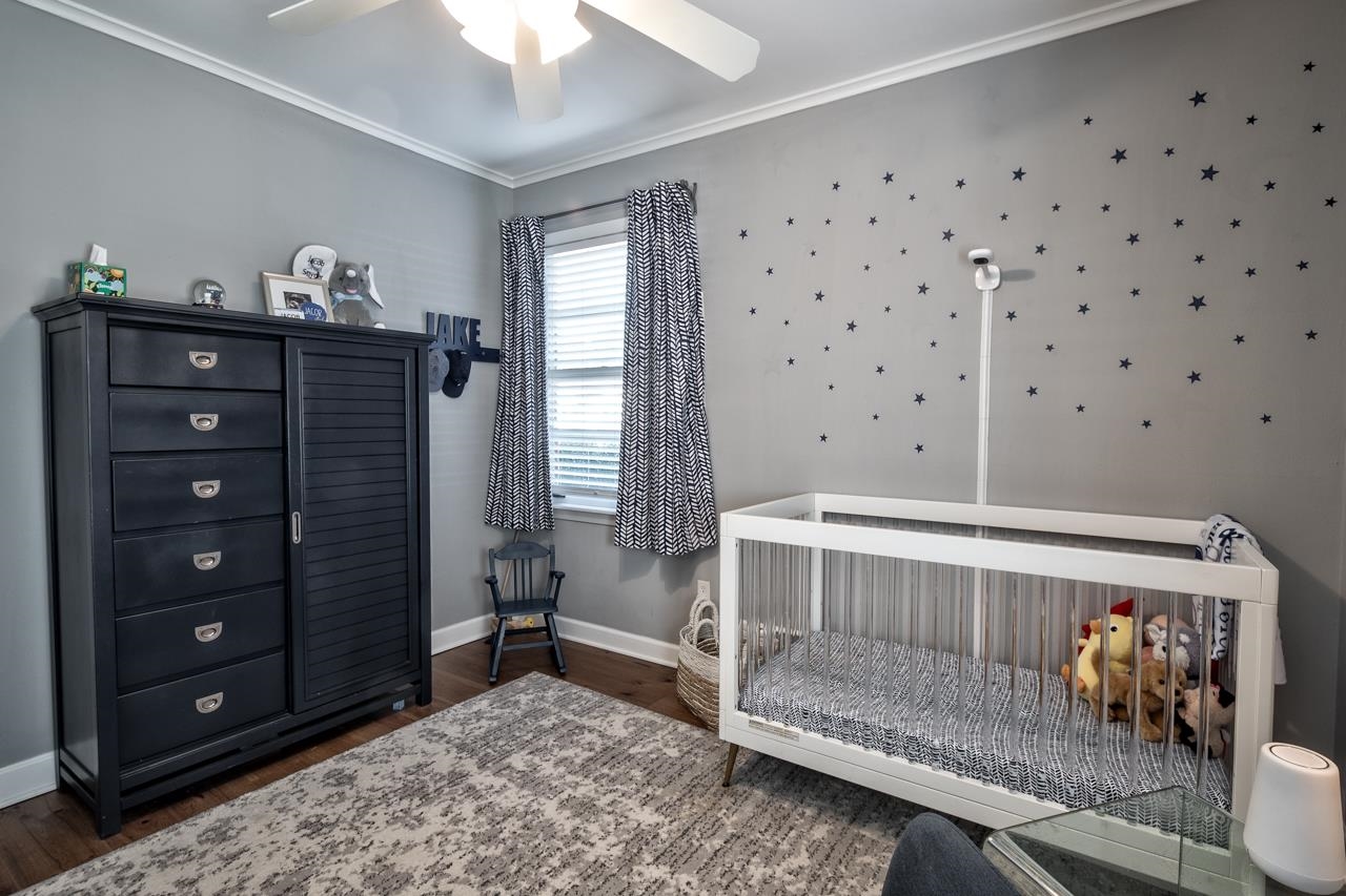 5135 Princeton Road Memphis, TN 38117 - Photo 16 of 24 a bedroom with furniture and wooden floor