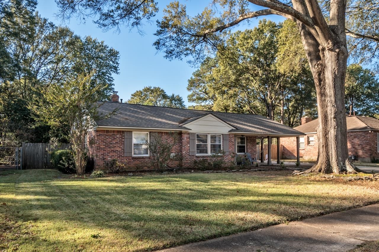 5135 Princeton Road Memphis, TN 38117 - Photo 2 of 24 a front view of a house with a garden