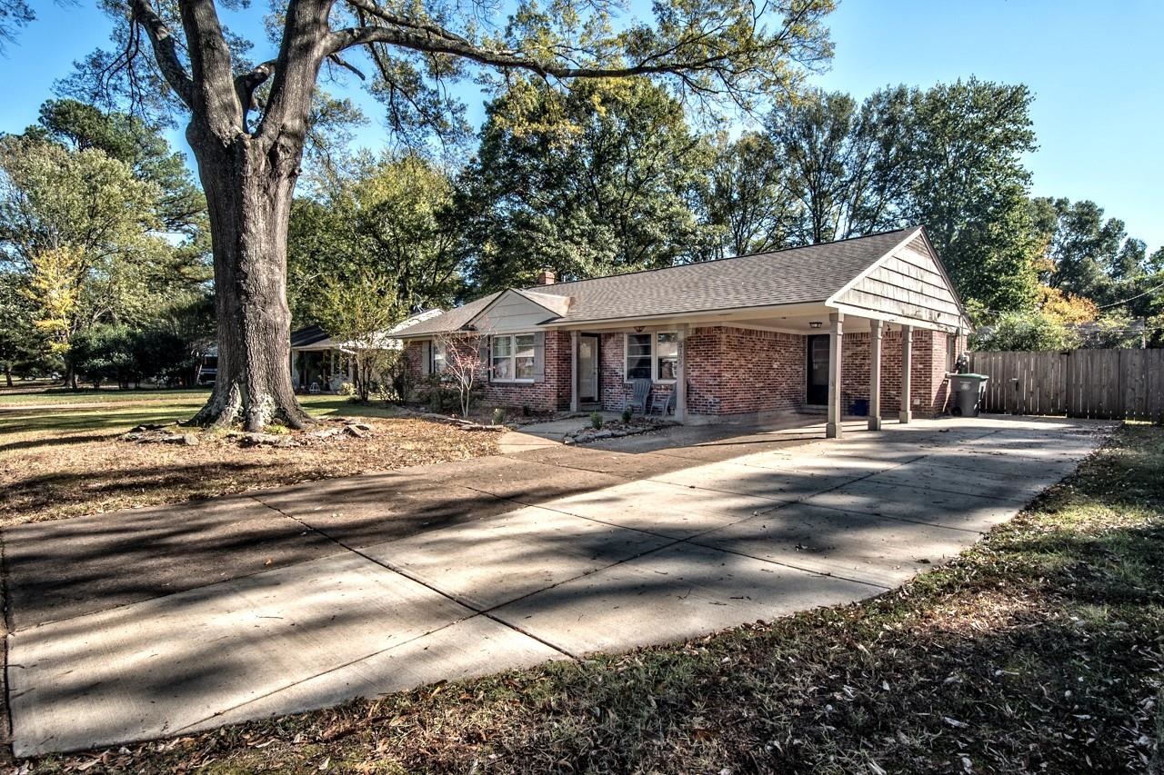 5135 Princeton Road Memphis, TN 38117 - Photo 24 of 24 a front view of a house with a yard