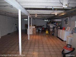 1289 Oakcrest Road Howell, MI 48843 - Photo 14 of 16 Full Basement