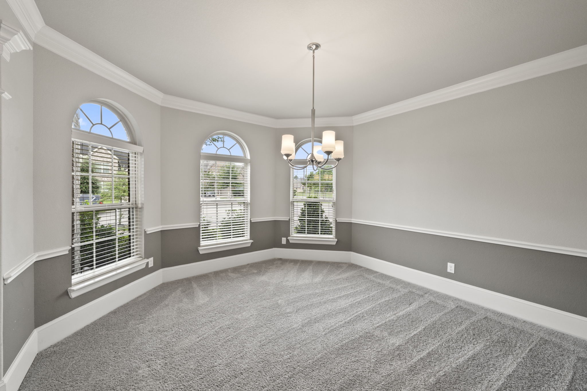 3938 Avalon Ridge Drive Spring, TX 77386 - Photo 5 of 49 As you enter, the dining room is to your left with large windows and crown moulding