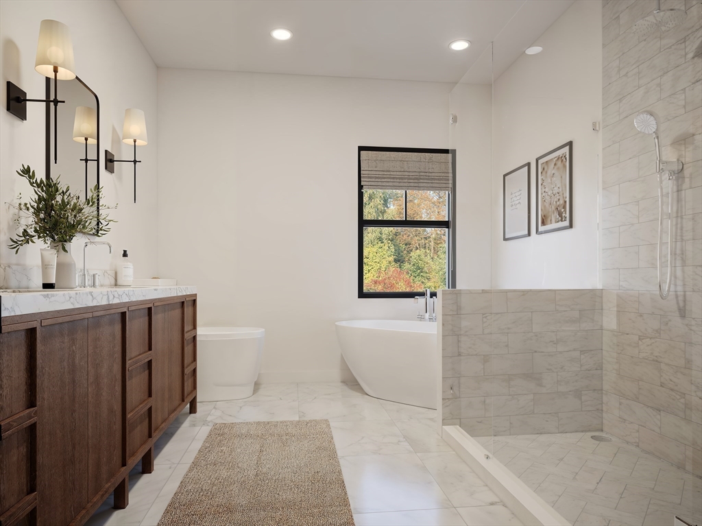 5 Clearwater Road Winchester, MA 01890 - Photo 5 of 9 a bathroom with a sink a toilet and shower