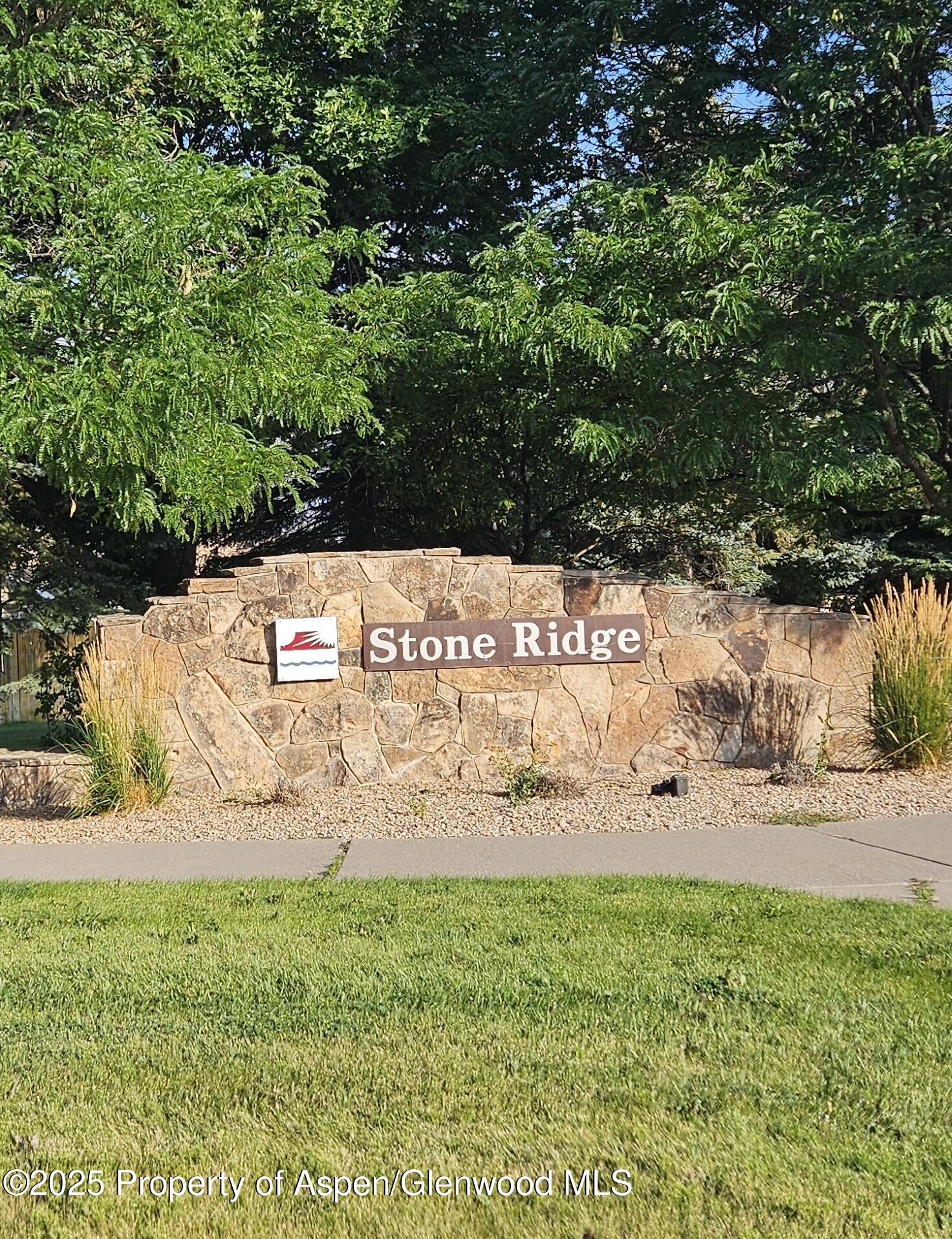489 Lodge Pole Circle Parachute, CO 81635 - Photo 4 of 4 a view of a field with plants and trees