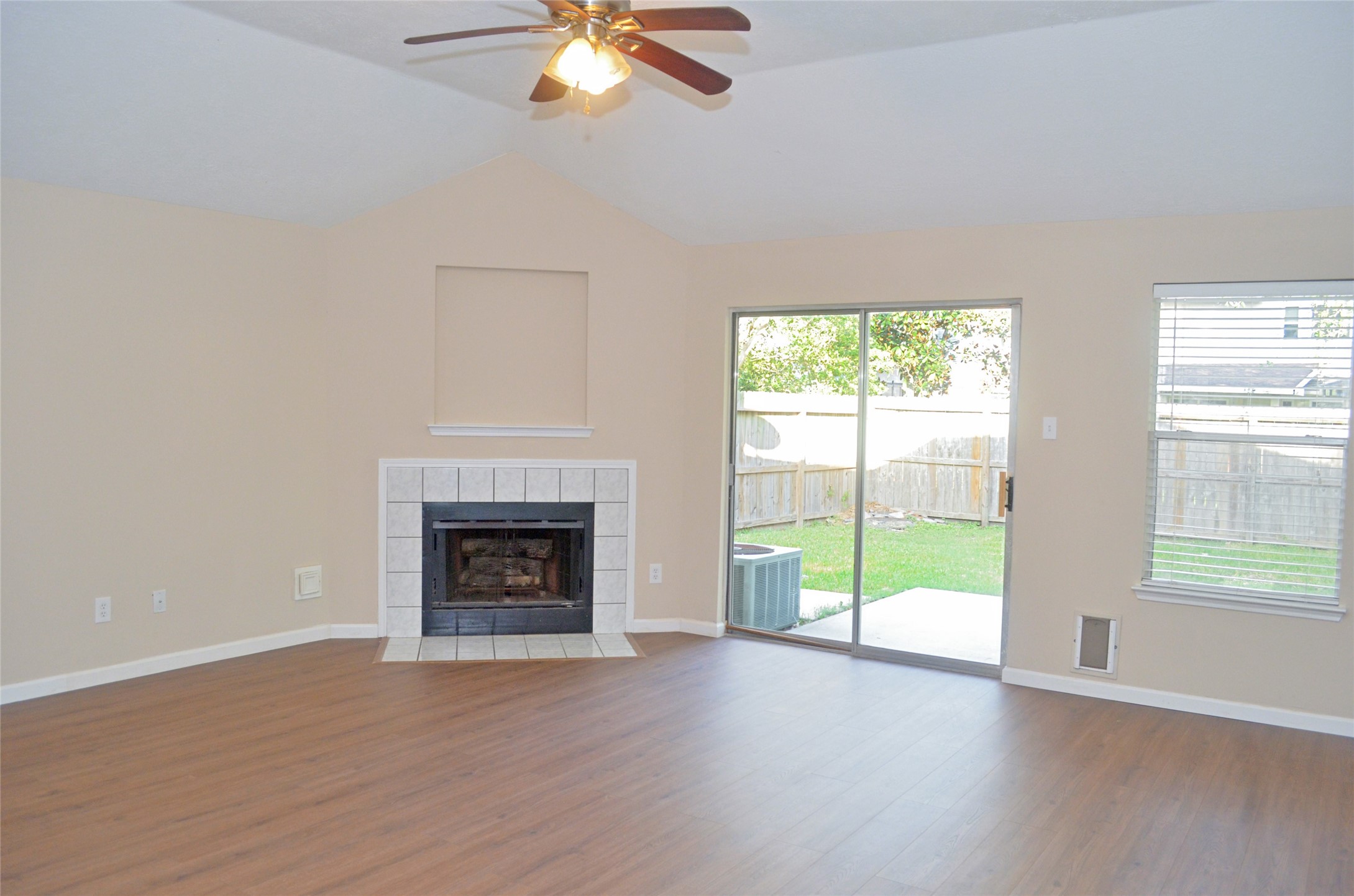 16915 Lighthouse View Drive Friendswood, TX 77546 - Photo 12 of 44 Living room with views of the backyard.
