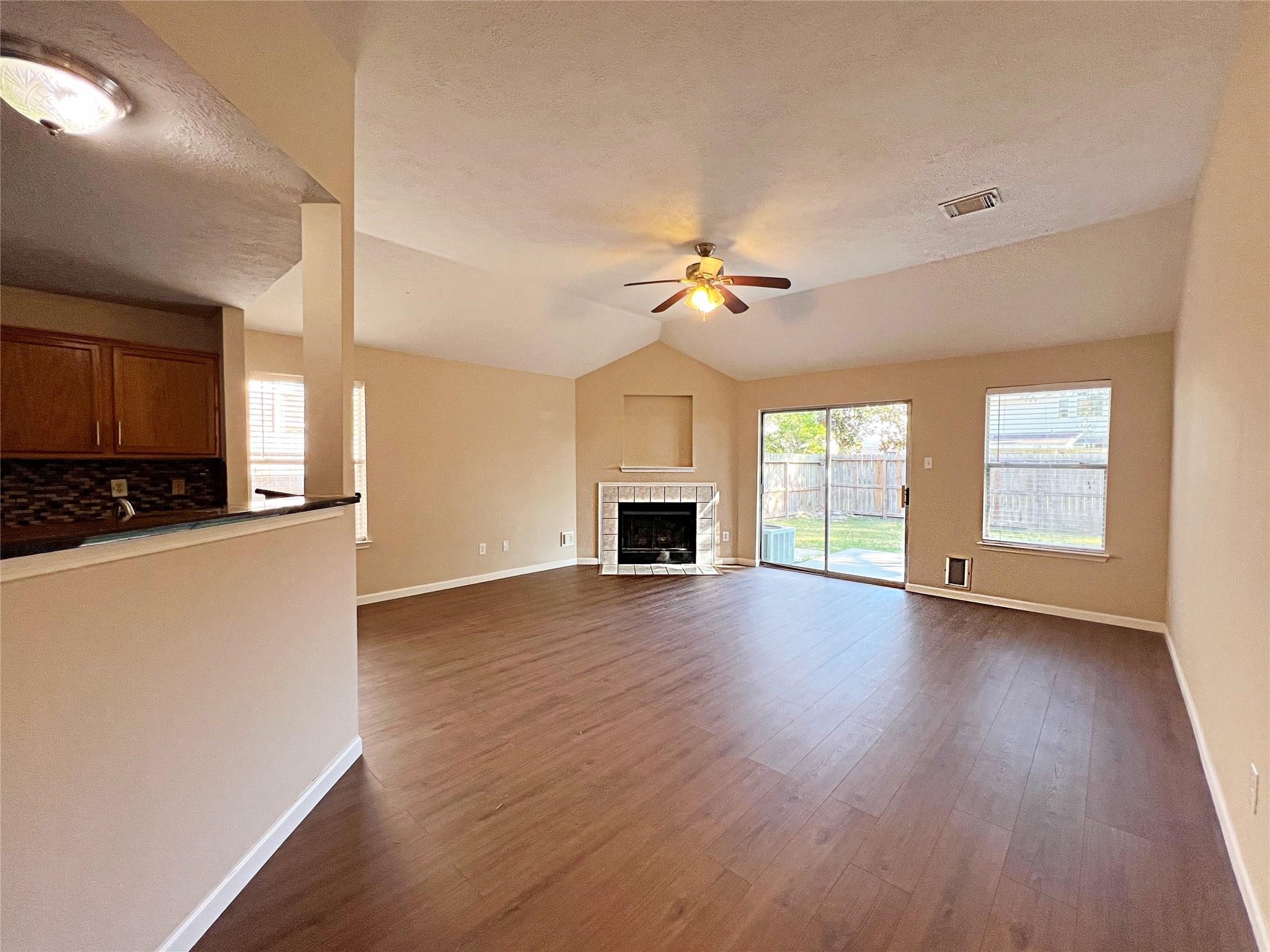 16915 Lighthouse View Drive Friendswood, TX 77546 - Photo 6 of 44 A spacious living room, with fireplace.