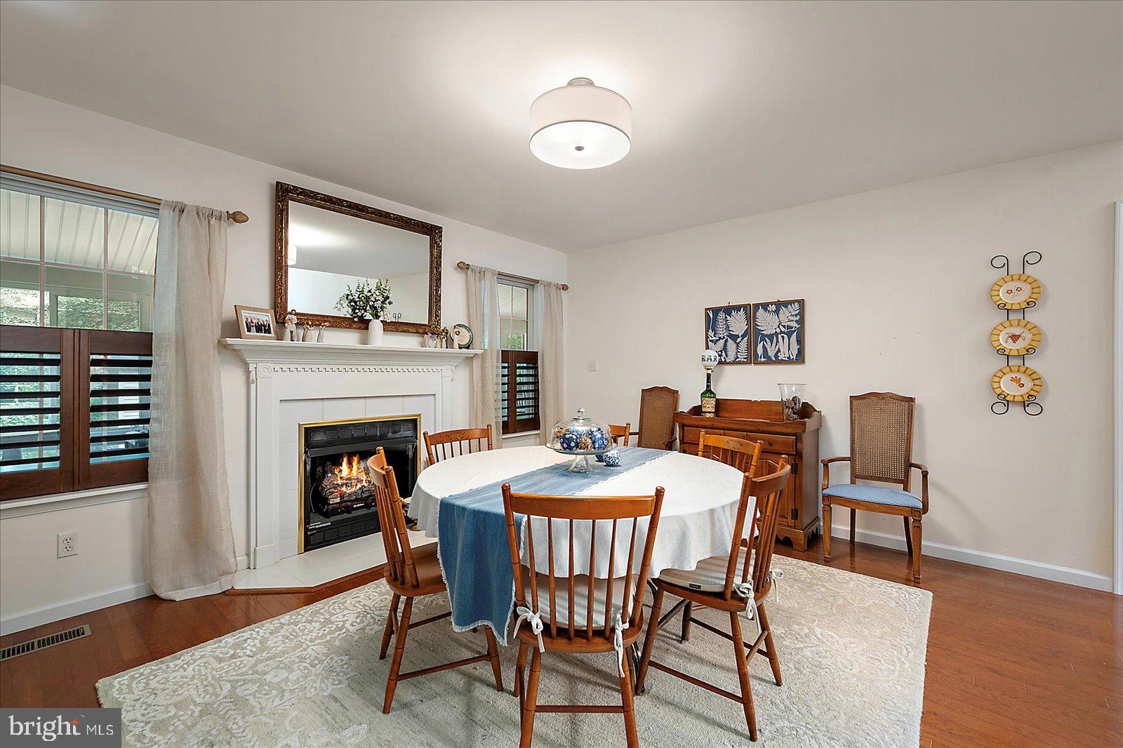 52 Sandyhook Road Ocean Pines, MD 21811 - Photo 25 of 131 a dining room with furniture and wooden floor
