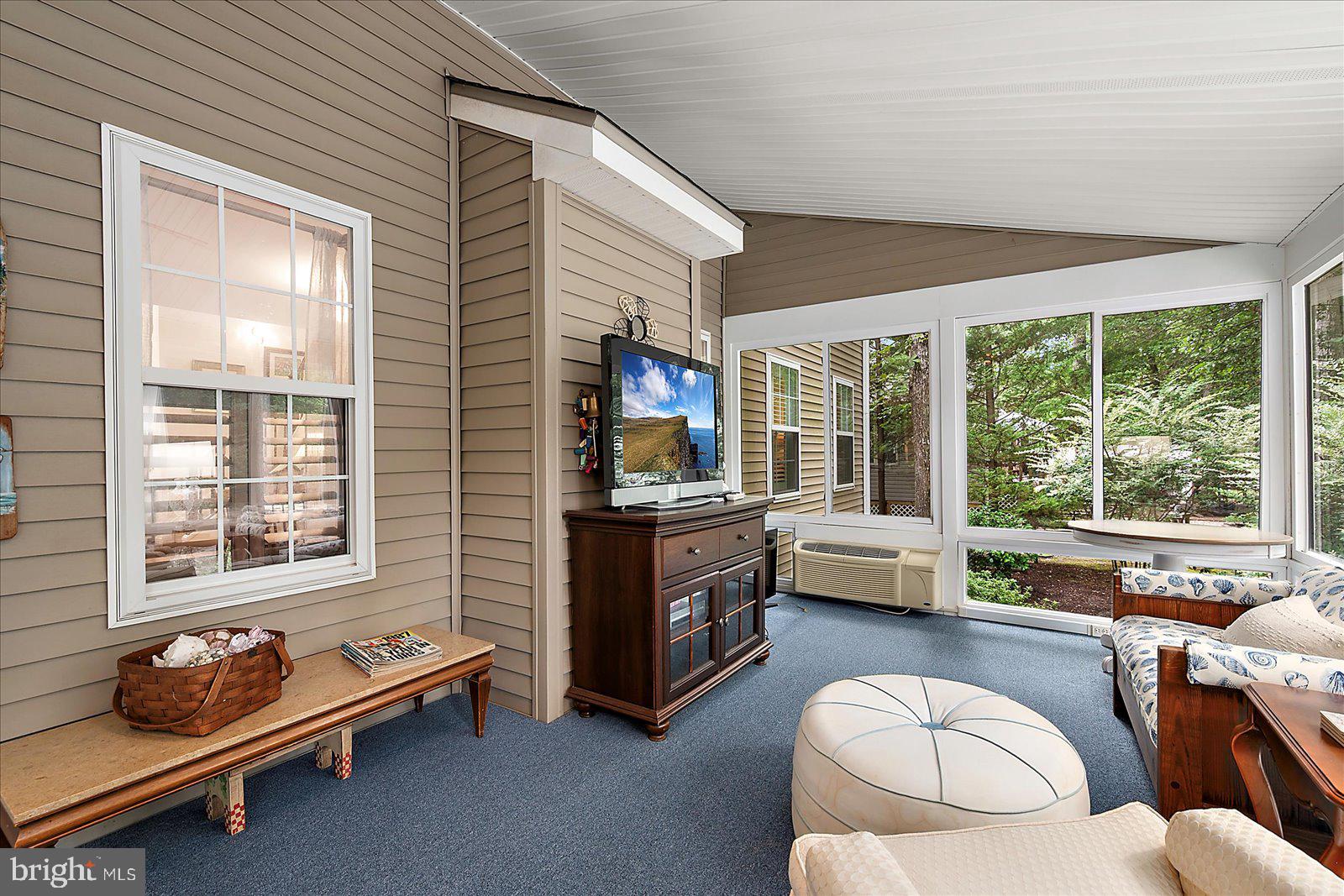 52 Sandyhook Road Ocean Pines, MD 21811 - Photo 36 of 131 a living room with furniture and a window