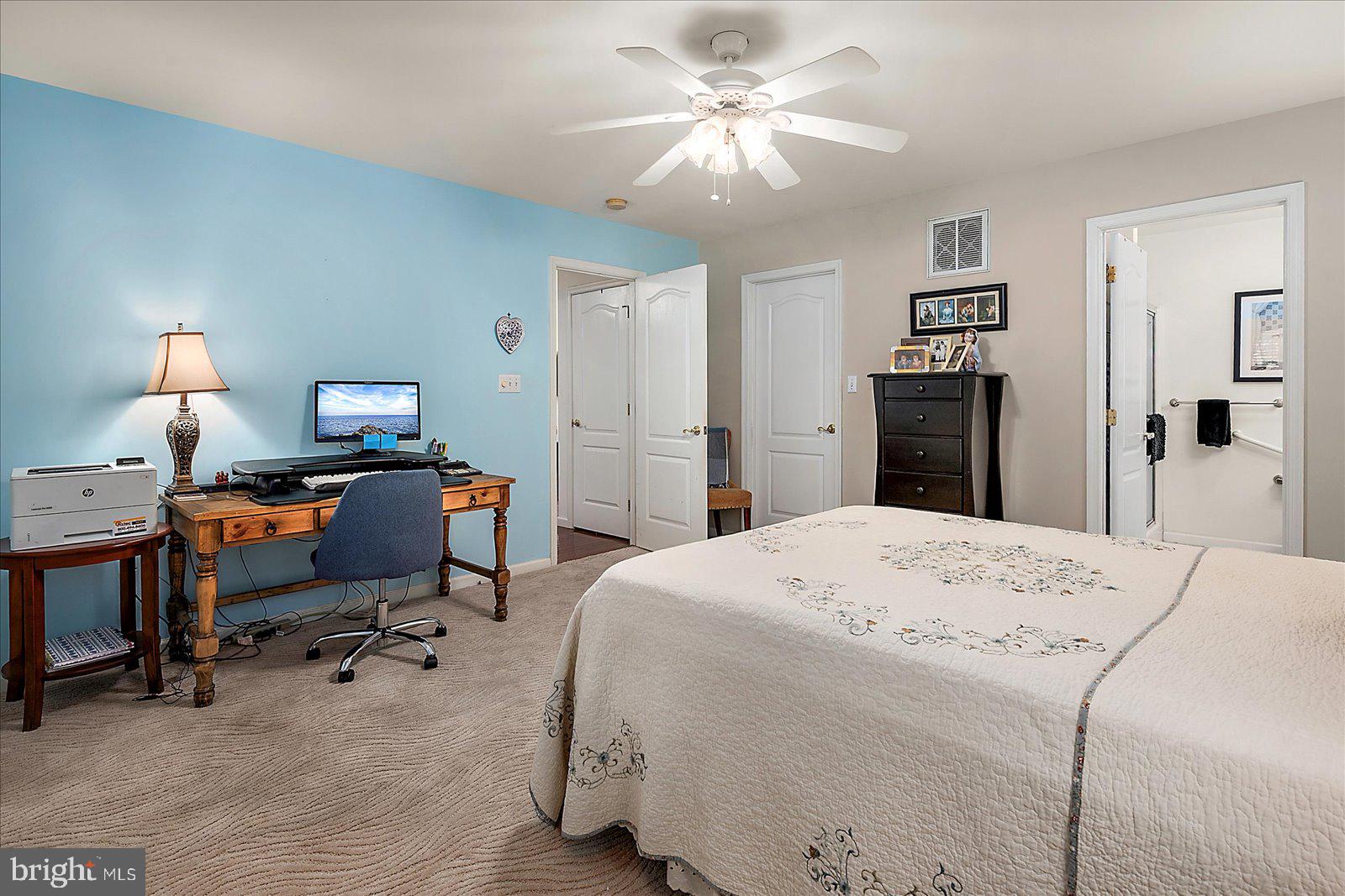 52 Sandyhook Road Ocean Pines, MD 21811 - Photo 42 of 131 a bed room with a bed and a chandelier