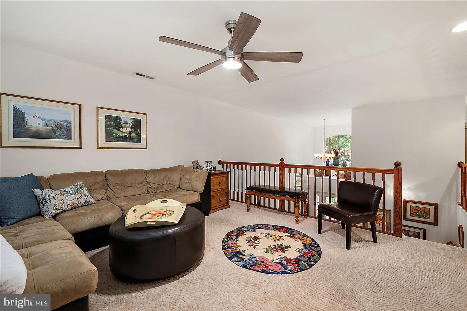 52 Sandyhook Road Ocean Pines, MD 21811 - Photo 48 of 131 a living room with furniture and a large window