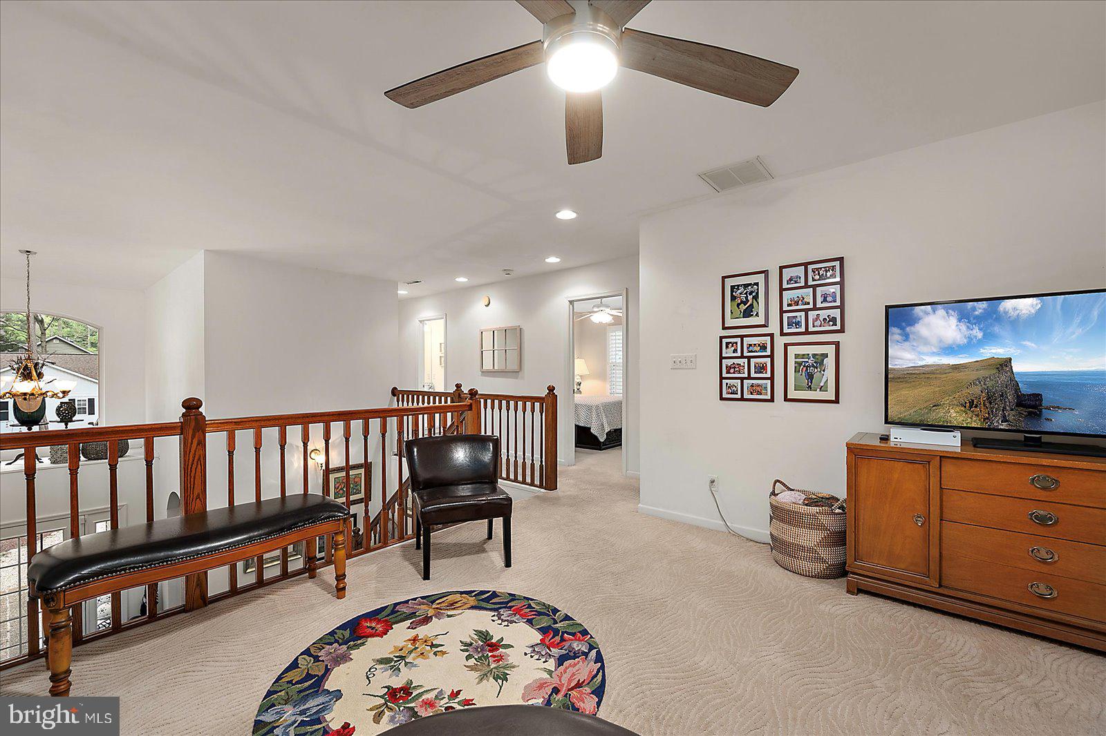 52 Sandyhook Road Ocean Pines, MD 21811 - Photo 49 of 131 a living room with furniture and a baby crib