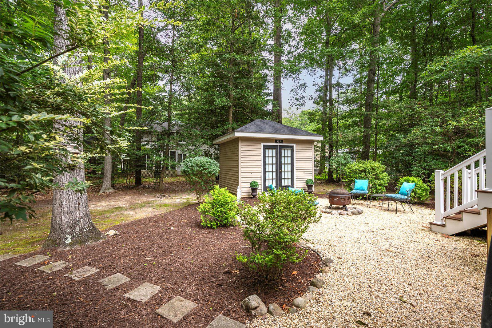 52 Sandyhook Road Ocean Pines, MD 21811 - Photo 74 of 131 a front view of a house with a yard and a tree
