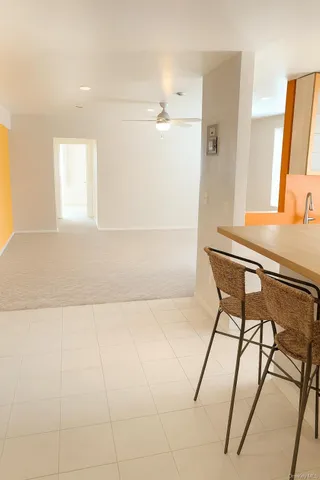 a bathroom with a shower and a table