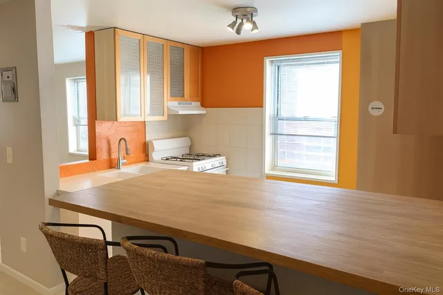 a room with a table and chairs