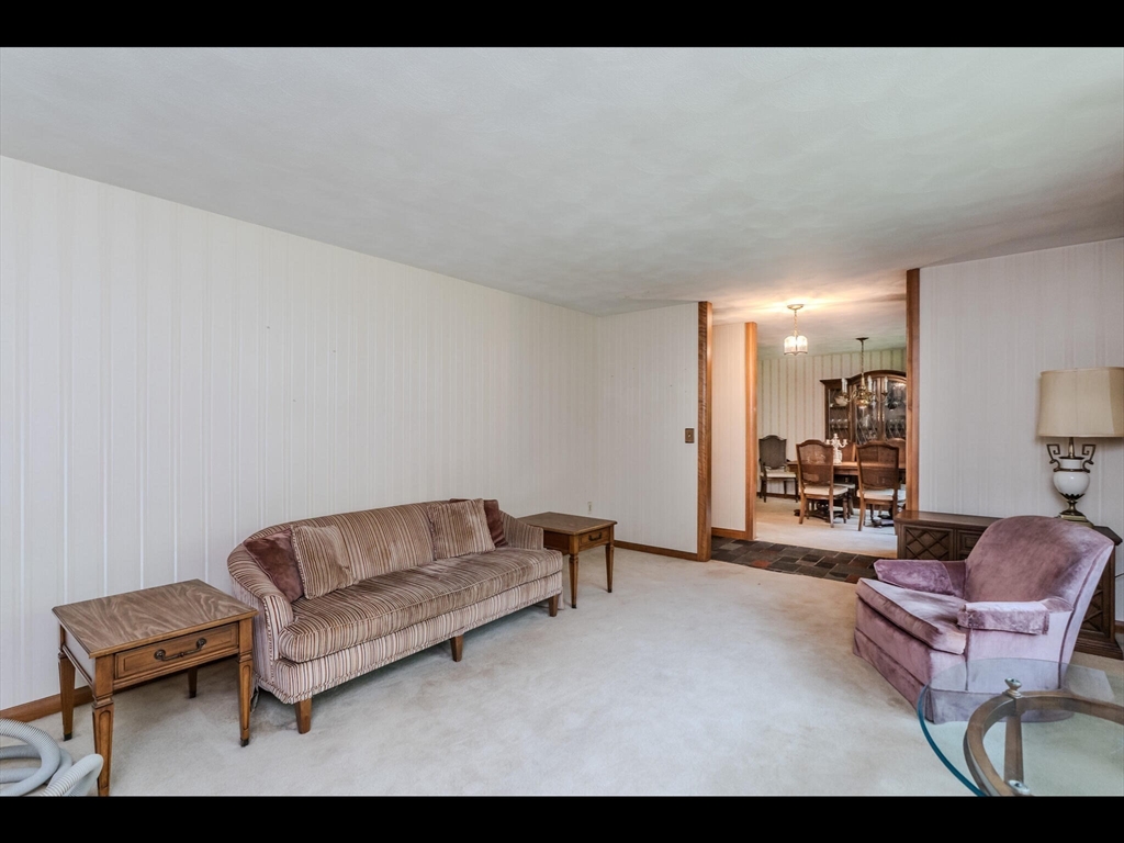 557 Maple Road Longmeadow, MA 01106 - Photo 12 of 31 a living room with furniture and a couch