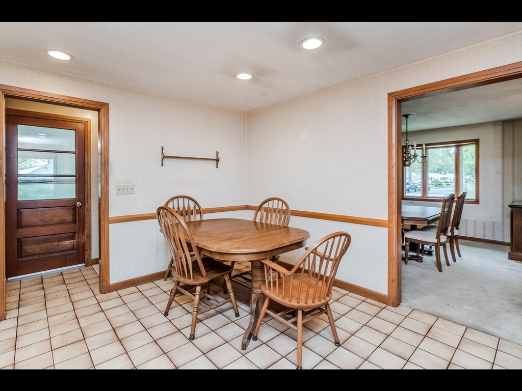 557 Maple Road Longmeadow, MA 01106 - Photo 17 of 31 a view of a dining room with furniture and window