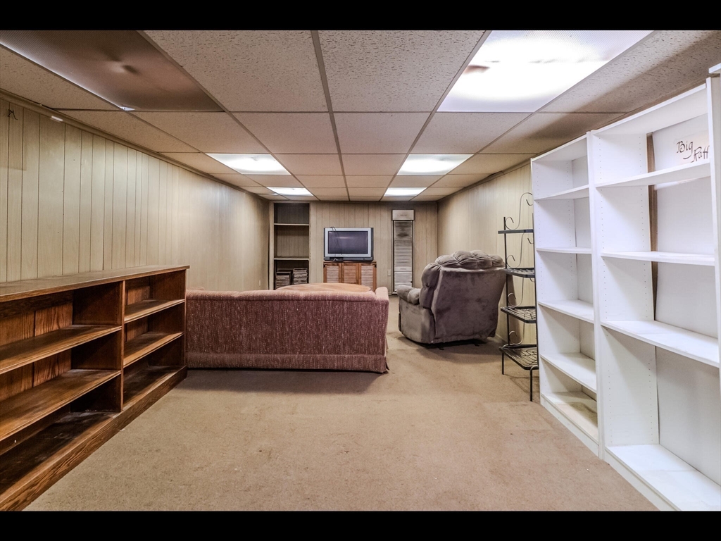 557 Maple Road Longmeadow, MA 01106 - Photo 25 of 31 a living room with furniture cabinets and window