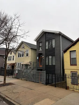 a front view of a house with a porch