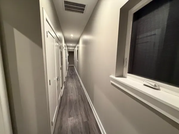 a view of hallway with stairs