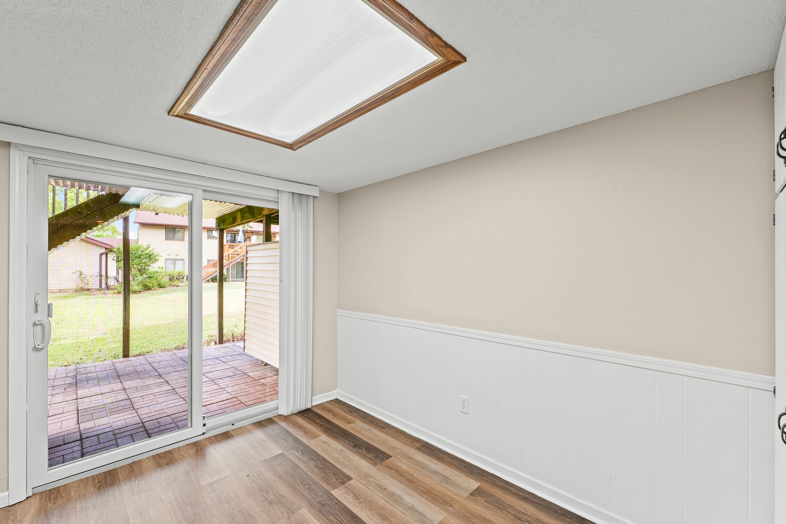 1304 Christopher Circle, Unit 1 Urbana, IL 61802 - Photo 7 of 18 a view of an empty room and window